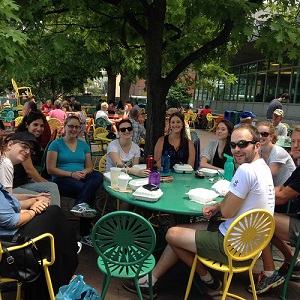 All lab members sitting around a table at the Terrace