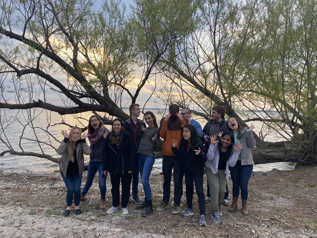 group picture of lab making funny faces