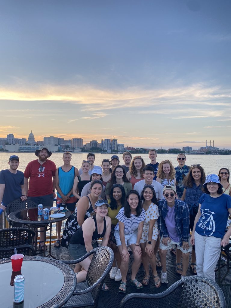 group photo with city of Madison in the background